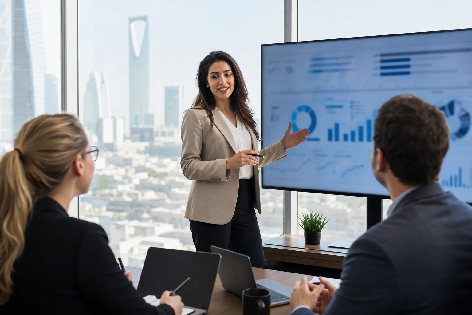 Performance marketer presenting campaign results in Riyadh
