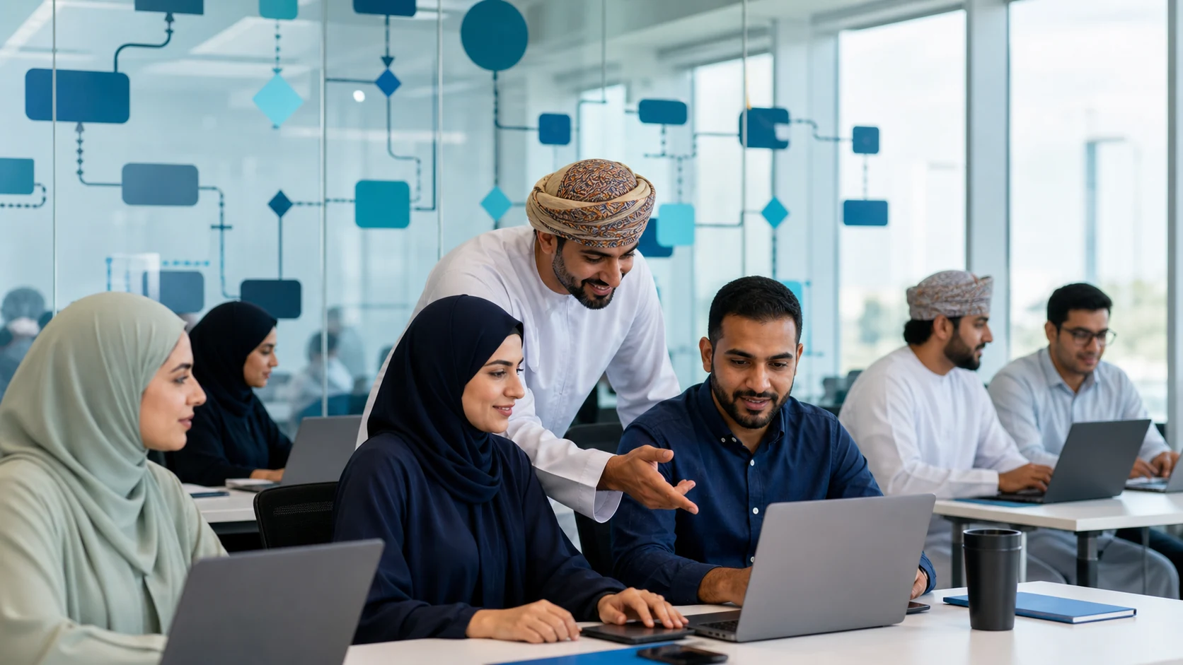 Professionals taking part in a hands-on AI automation workshop in Oman