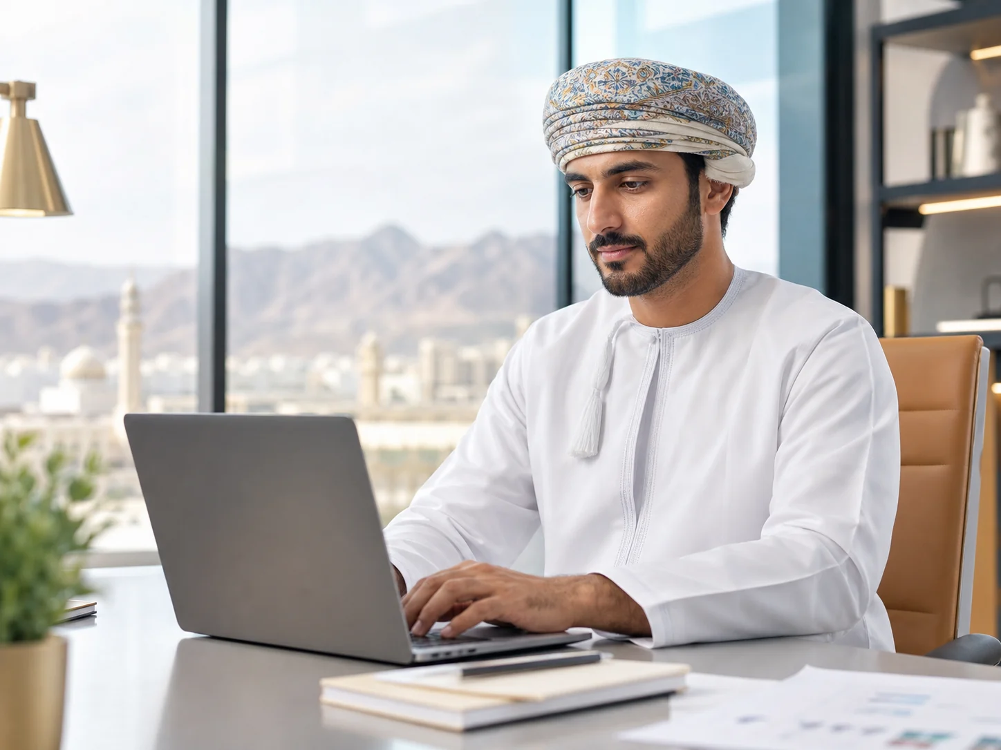 Omani professional applying practical AI skills at work