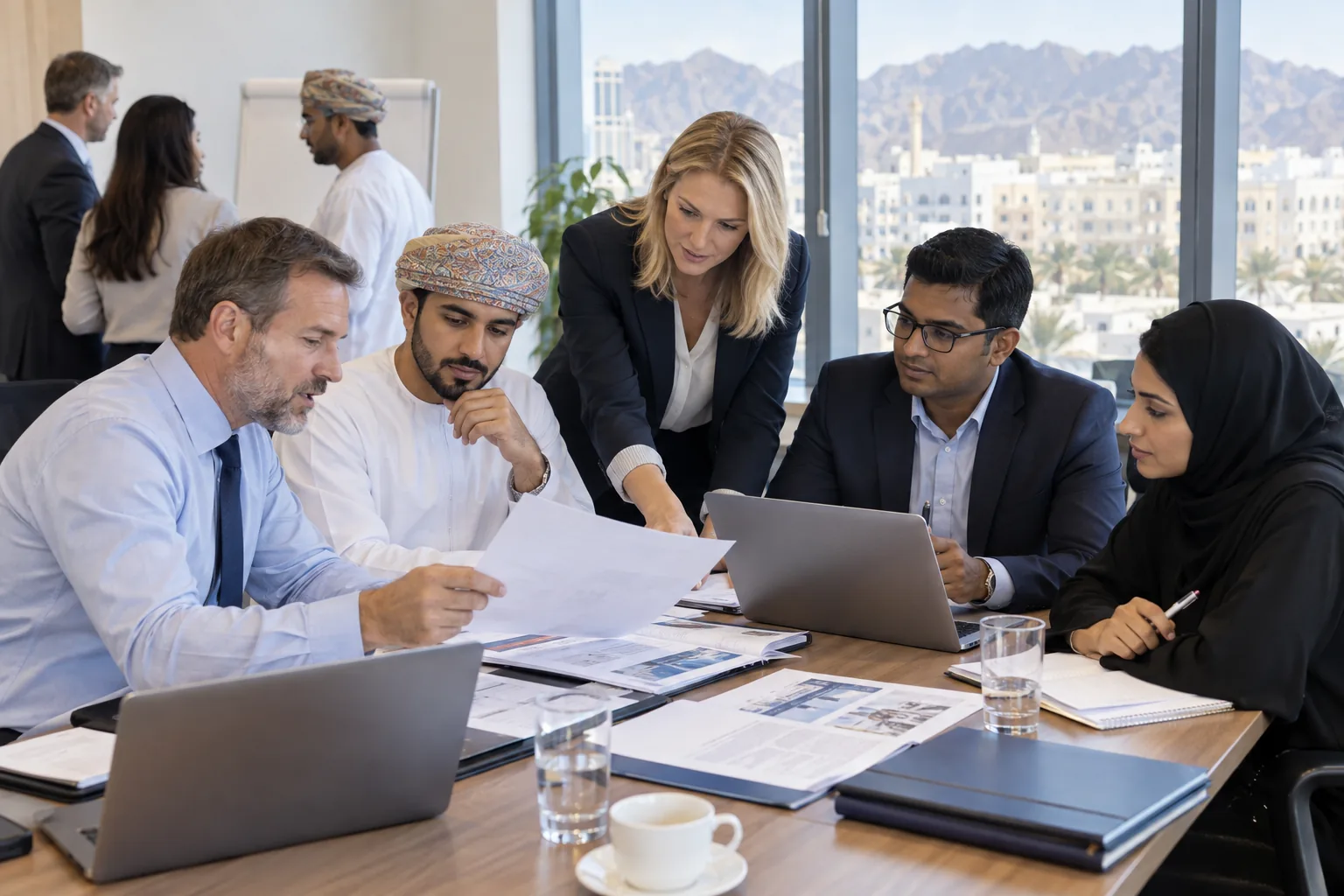 Procurement professionals reviewing supplier proposals during CIPS Level 4 training in Muscat