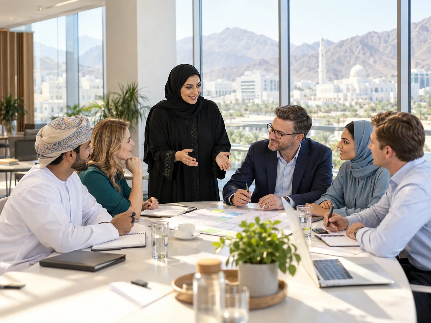 Omani and international professionals in a bright corporate skills workshop in Muscat