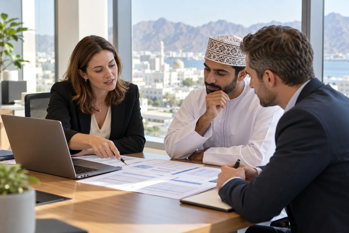 Illustrative procurement professionals reviewing documents during AI learning in Oman