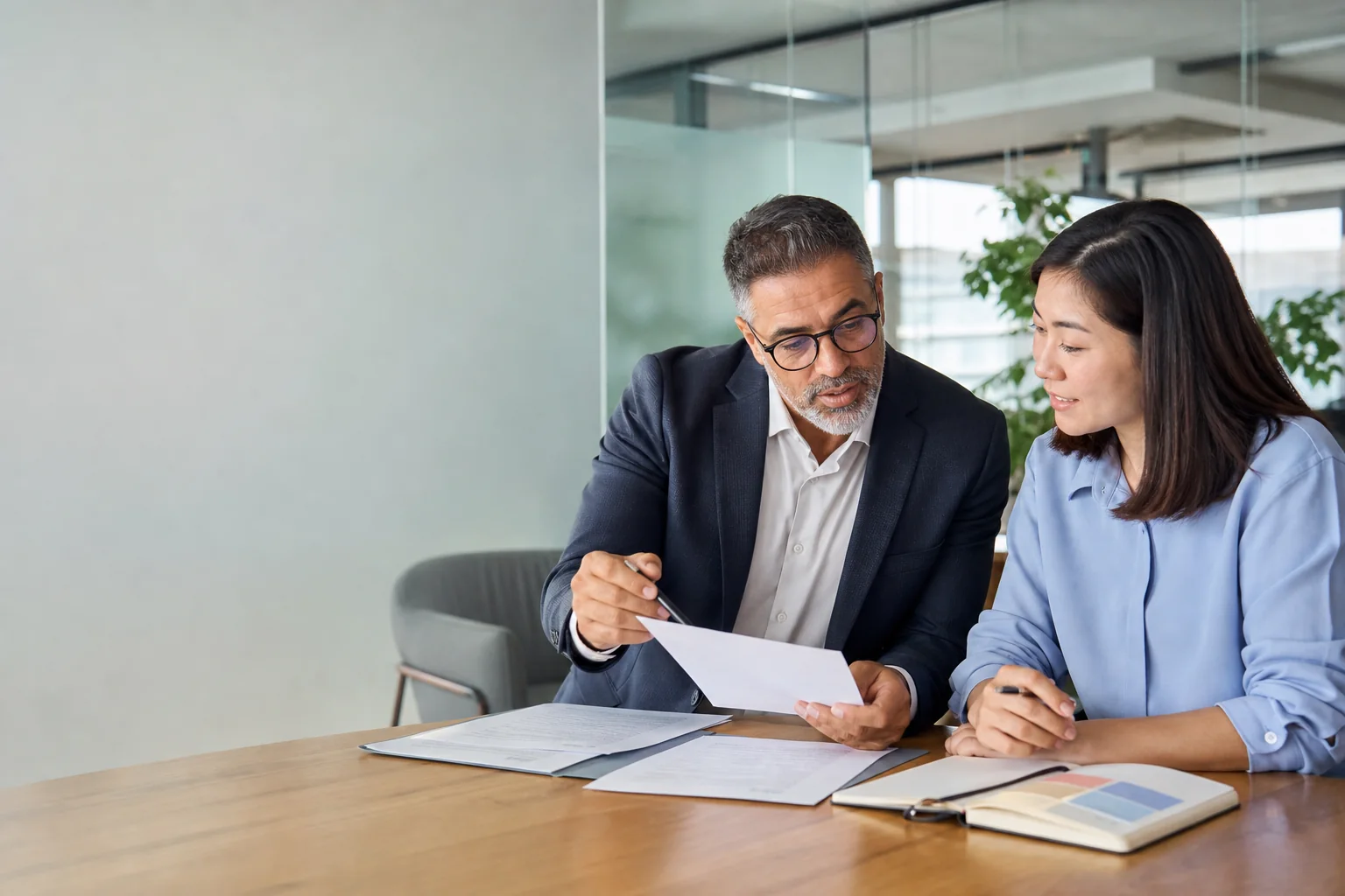 Accounting mentor helping a learner review documents for an ACCA entry route.